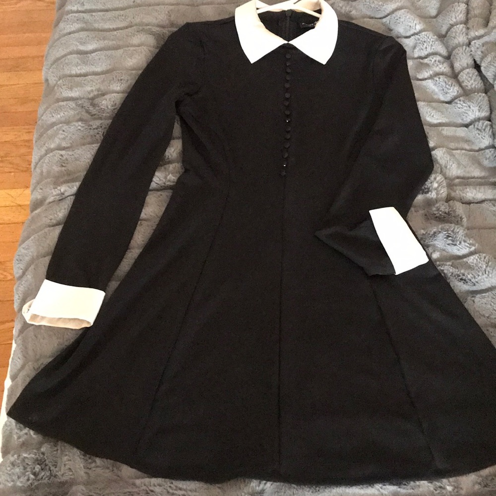 Black dress with white collar and cuff
